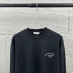Dark long-sleeve crewneck sweatshirt with Christian Dior Atelier logo on chest