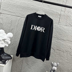 Black crewneck sweatshirt with DIOR logo across chest, long sleeves