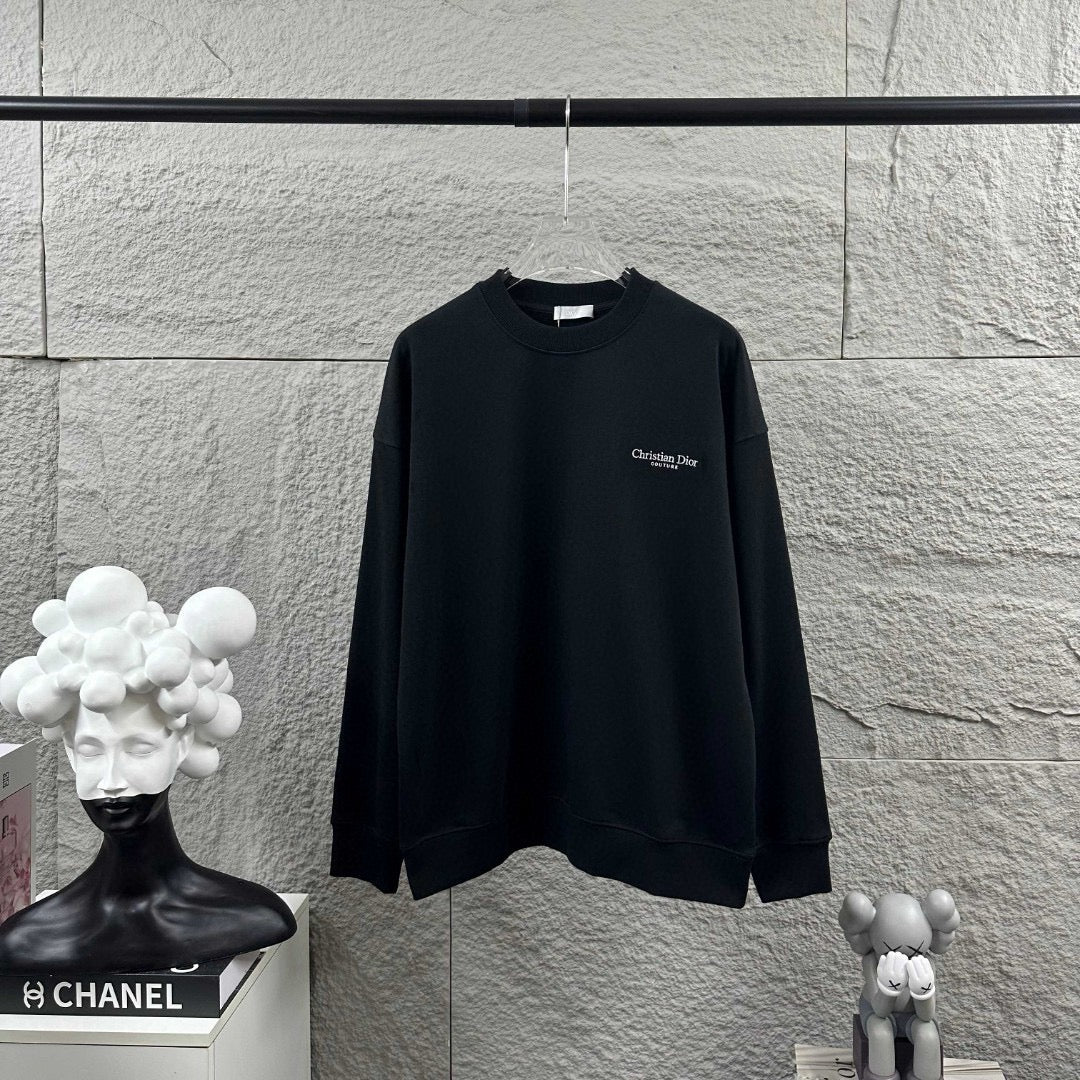 Black long-sleeve crewneck sweatshirt with small Christian Dior Couture chest logo