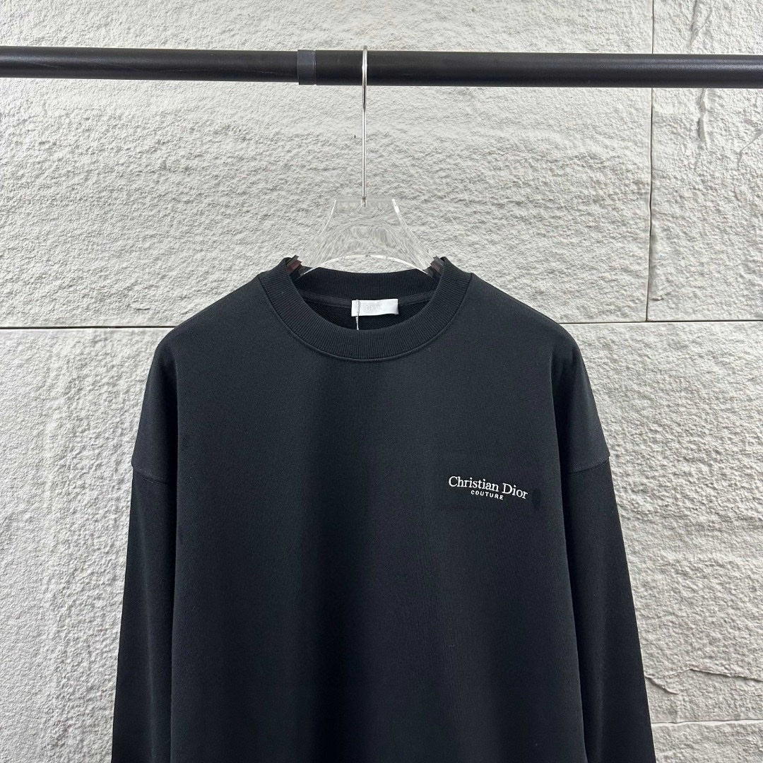 Black long-sleeve crewneck sweatshirt with small Christian Dior Couture chest logo
