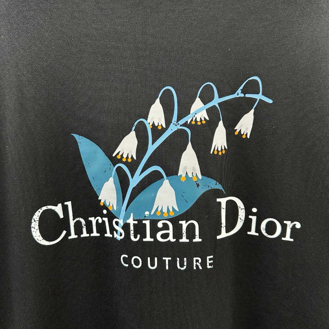 Christian Dior Couture graphic on black long-sleeve sweatshirt with blue/white icons