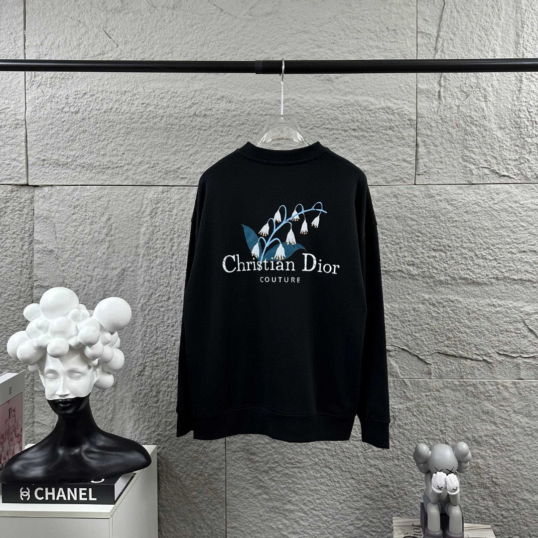 Black long-sleeve crewneck sweatshirt with Christian Dior Couture front graphic