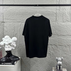 Black short-sleeve T-shirt, plain back view on a hanger