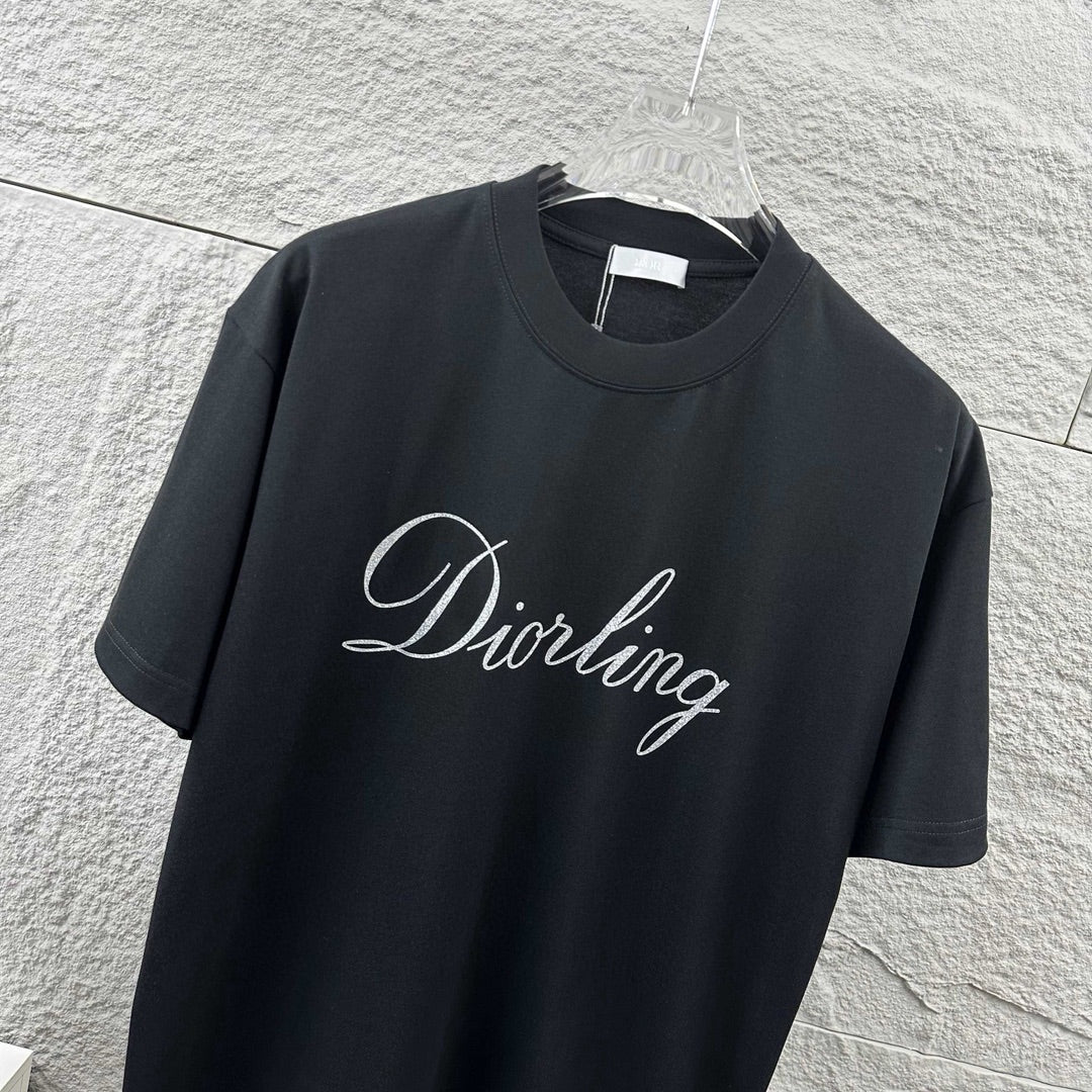 Close-up: black short-sleeve crewneck T-shirt with “Diortling” script logo