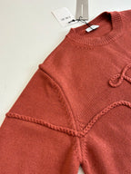 Dior knit sweater sleeve and shoulder, rust red, ribbed collar and decorative trim