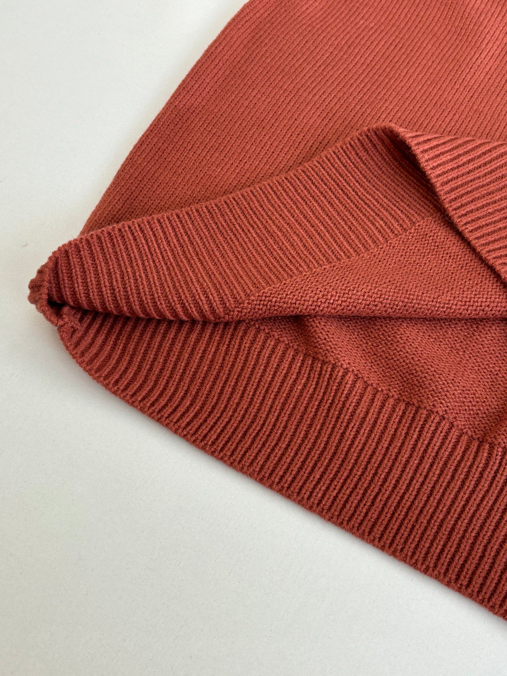 Dior knit sweater, rust red, folded sleeve cuffs with ribbed knit texture