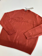 Dior knit sweater, rust red, folded flat, crew neck and embroidered logo detail