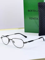 Bottega Veneta glasses with clear lenses and gray frames