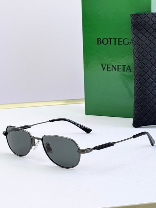 Bottega Veneta glasses with black frames and tinted lenses, side view