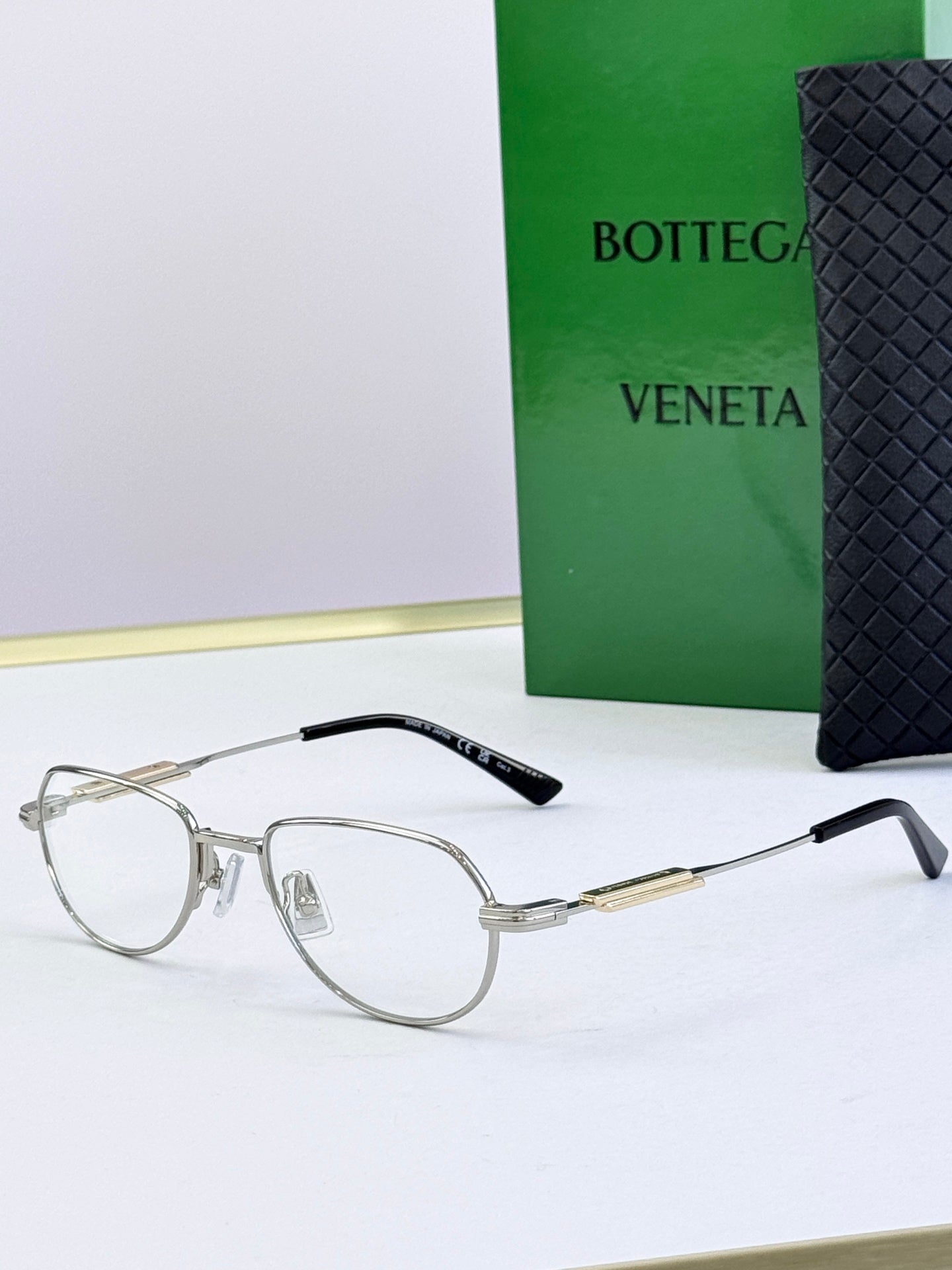 Bottega Veneta glasses with clear lenses and transparent frames