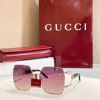 Gucci sunglasses with square gradient lenses and gold-tone frames, pink and purple tones