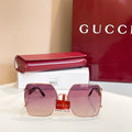 Square sunglasses with rose-gold metal frame and purple tinted lenses, front view.