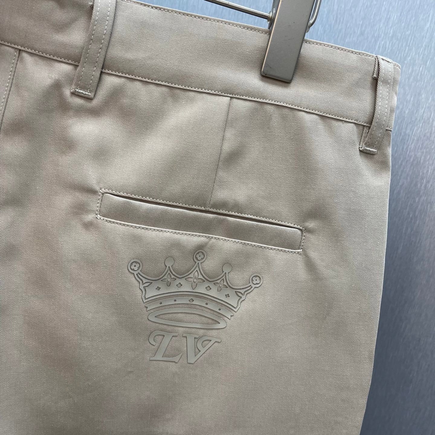 Louis Vuitton tan pants back waistband with LV crown logo