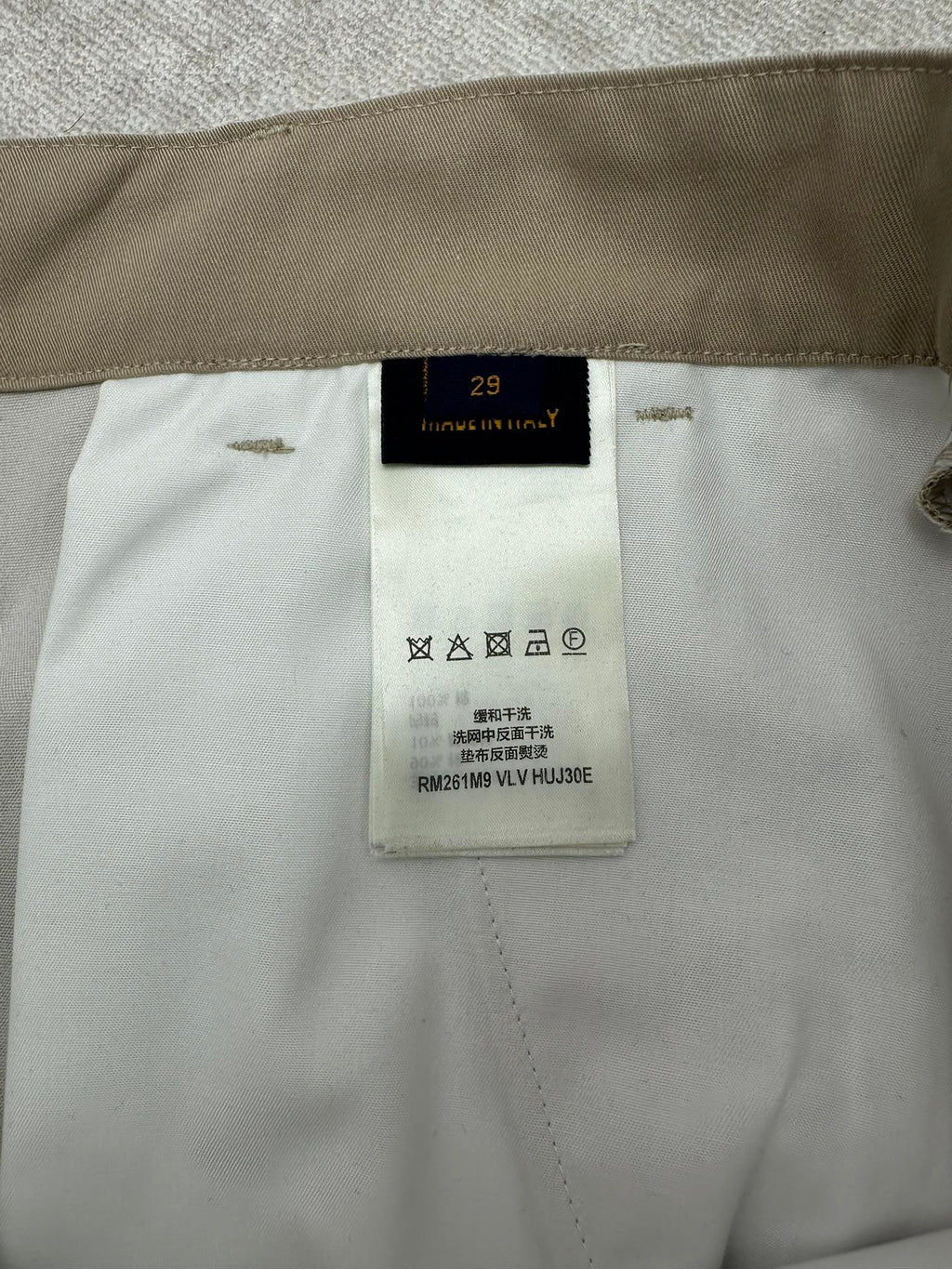 Louis Vuitton pants interior care label and waistband tag, light beige
