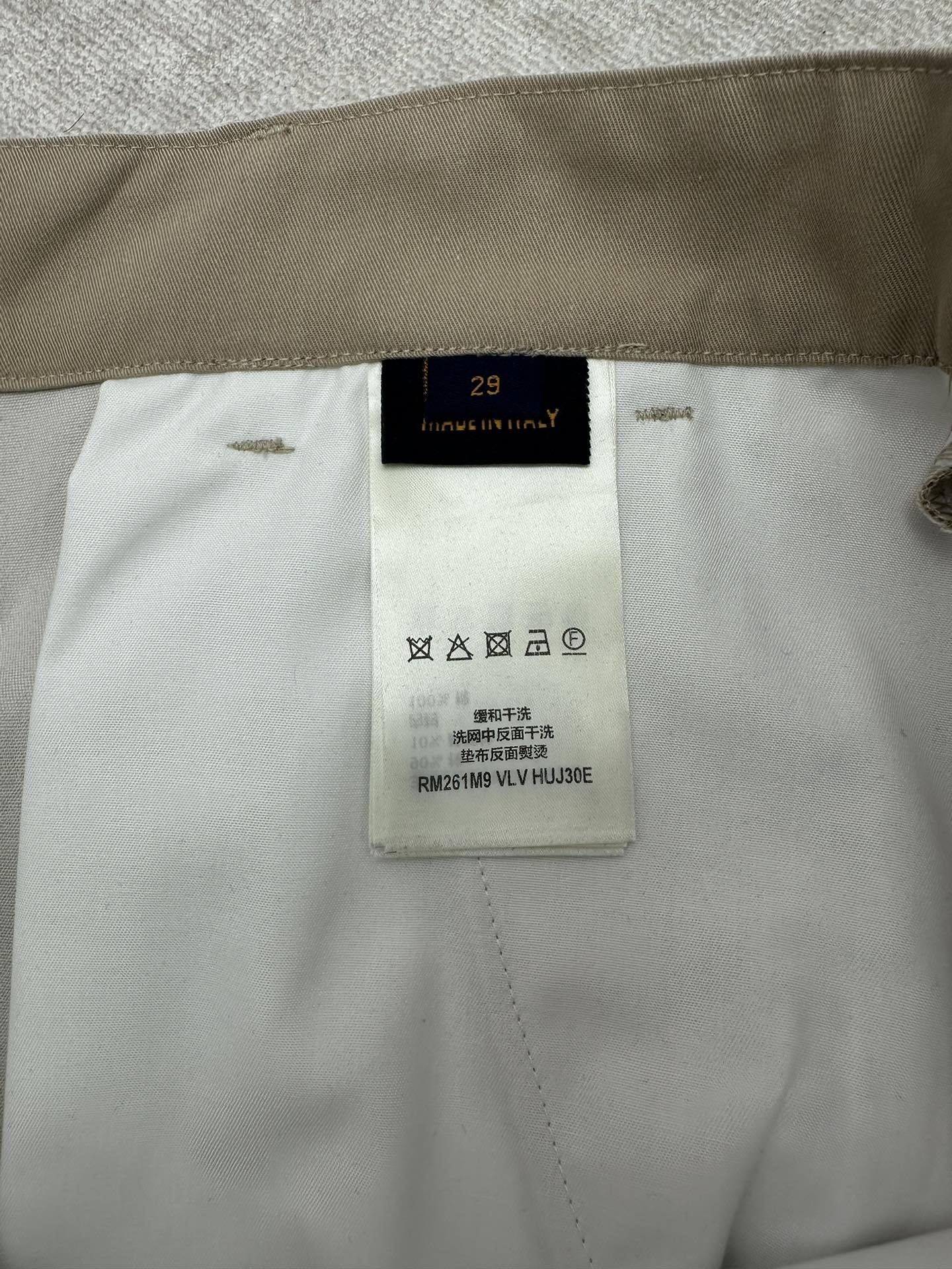 Louis Vuitton pants interior care label and waistband tag, light beige