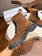 Givenchy brown suede lace-up ankle boot on display with black lug sole