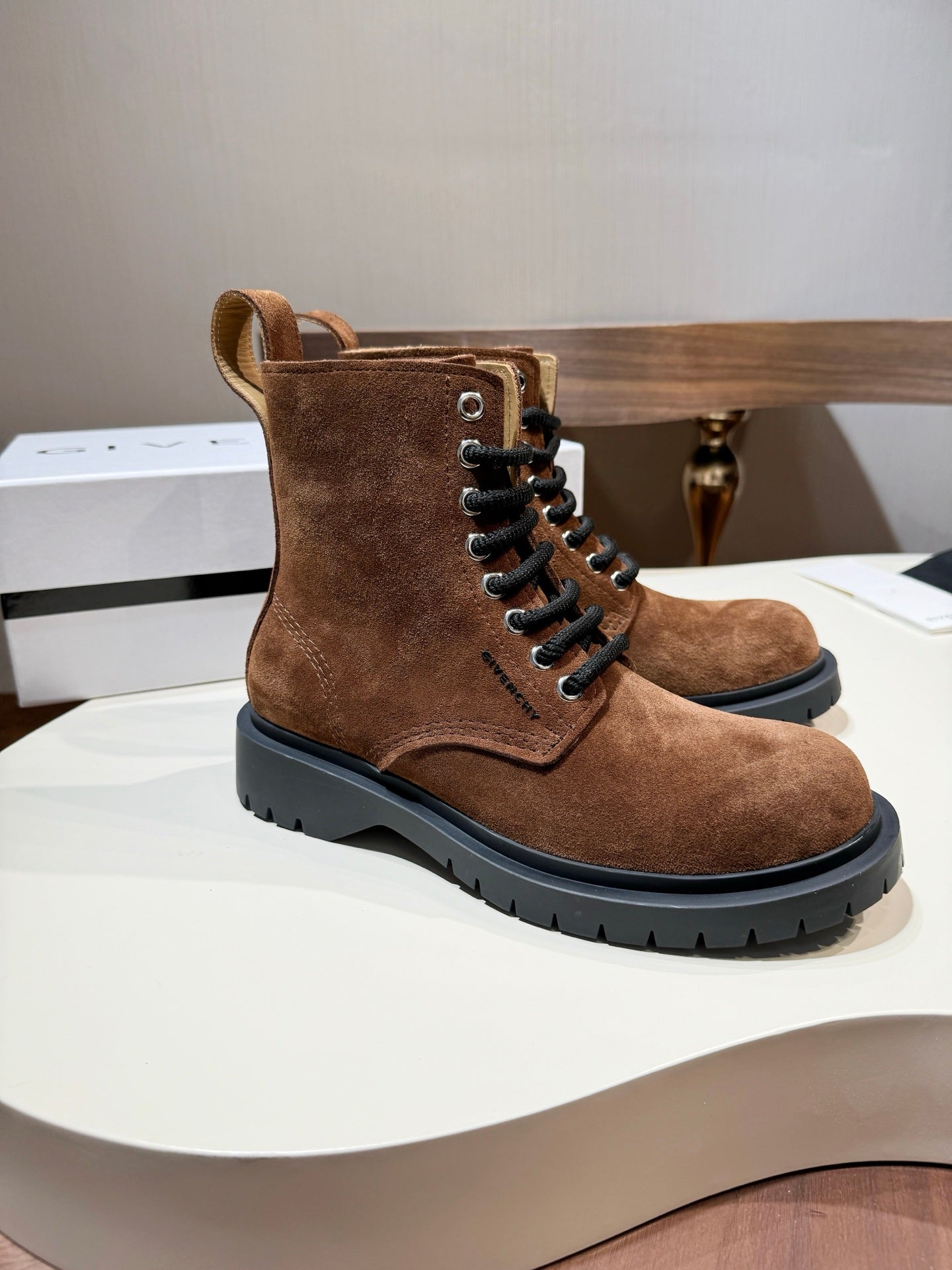 Givenchy brown suede lace-up ankle boot with black laces and chunky lug sole