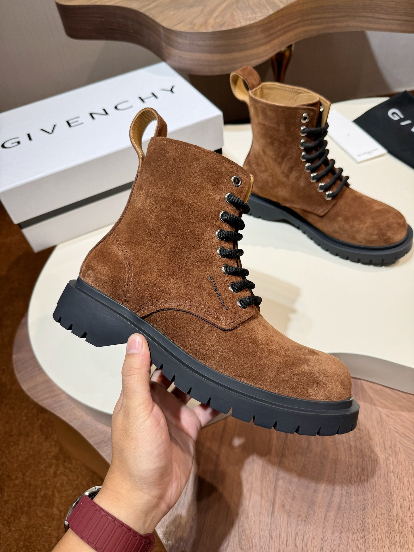 Givenchy brown suede lace-up boot with black rubber lug sole and side eyelets
