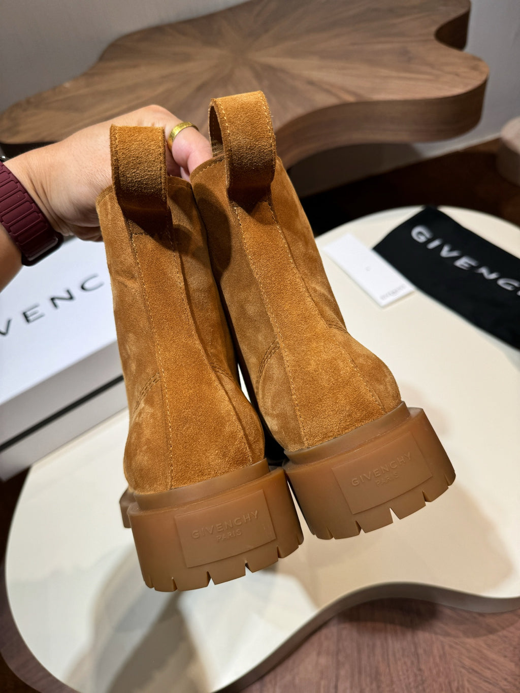 Tan suede ankle boots showing chunky lug soles