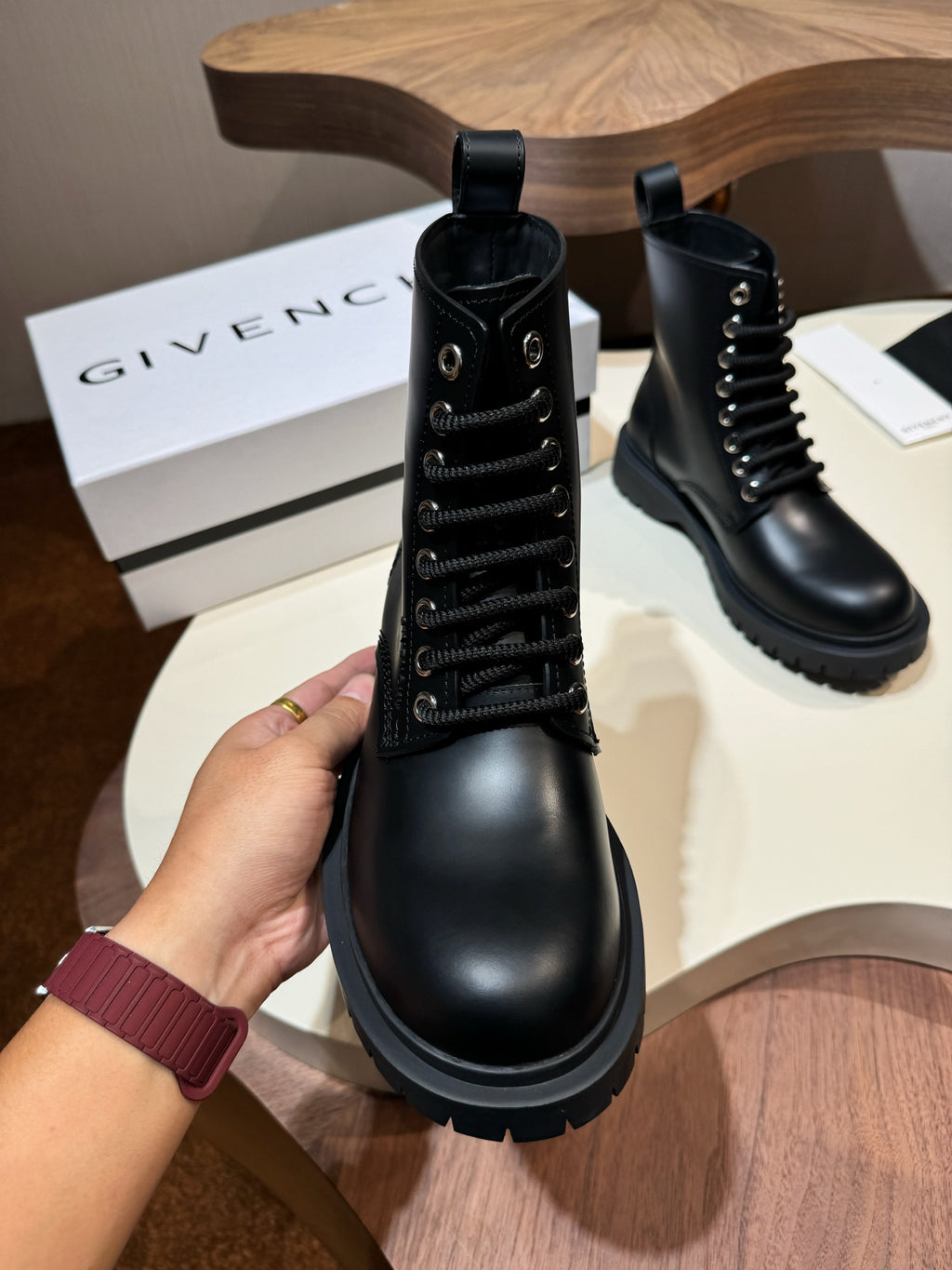 Givenchy black lace-up boots with side pull tab and rugged sole