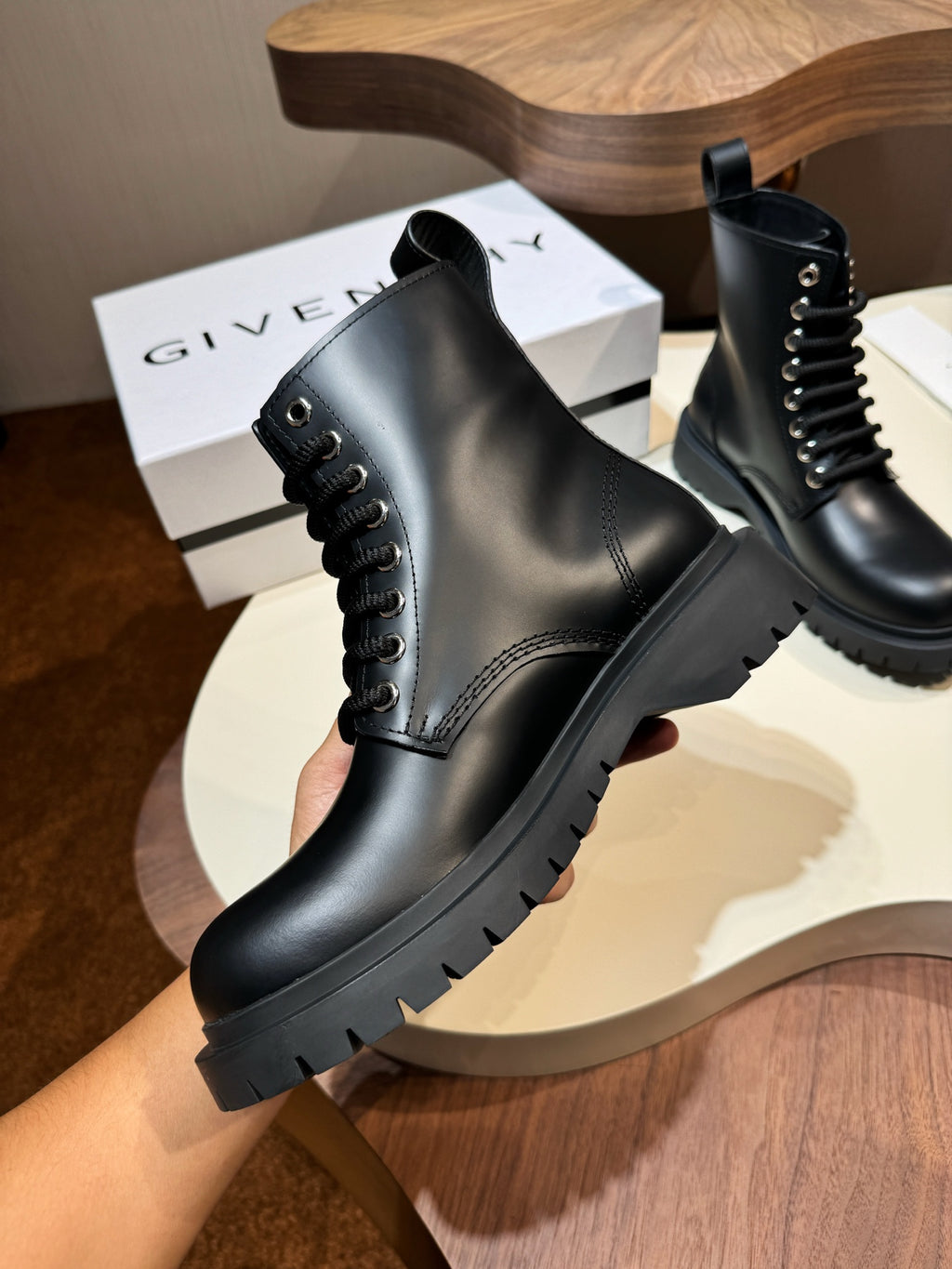 Givenchy black leather lace-up combat boots with contrast stitching