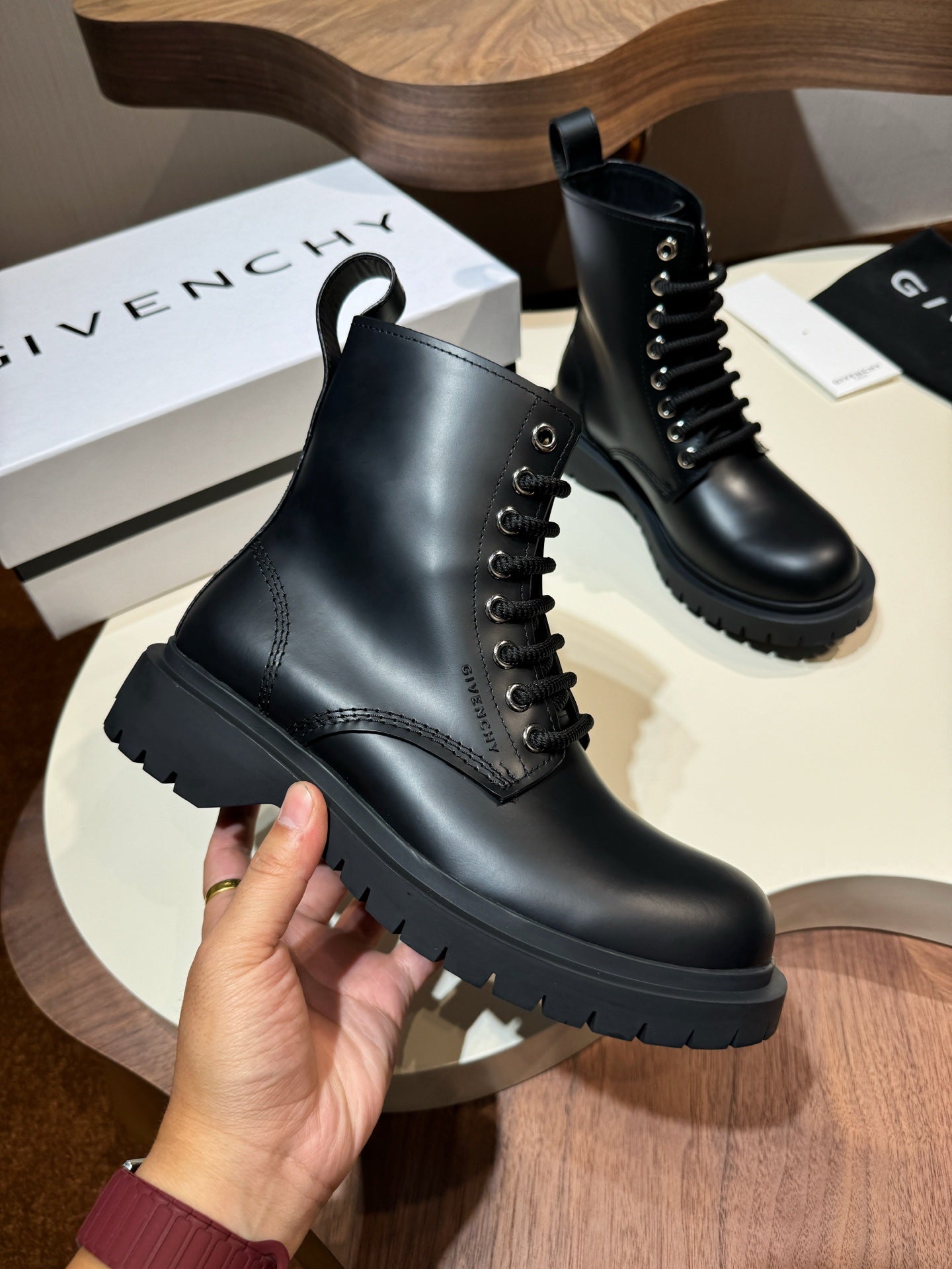 Givenchy black leather lace-up boots with thick lug sole