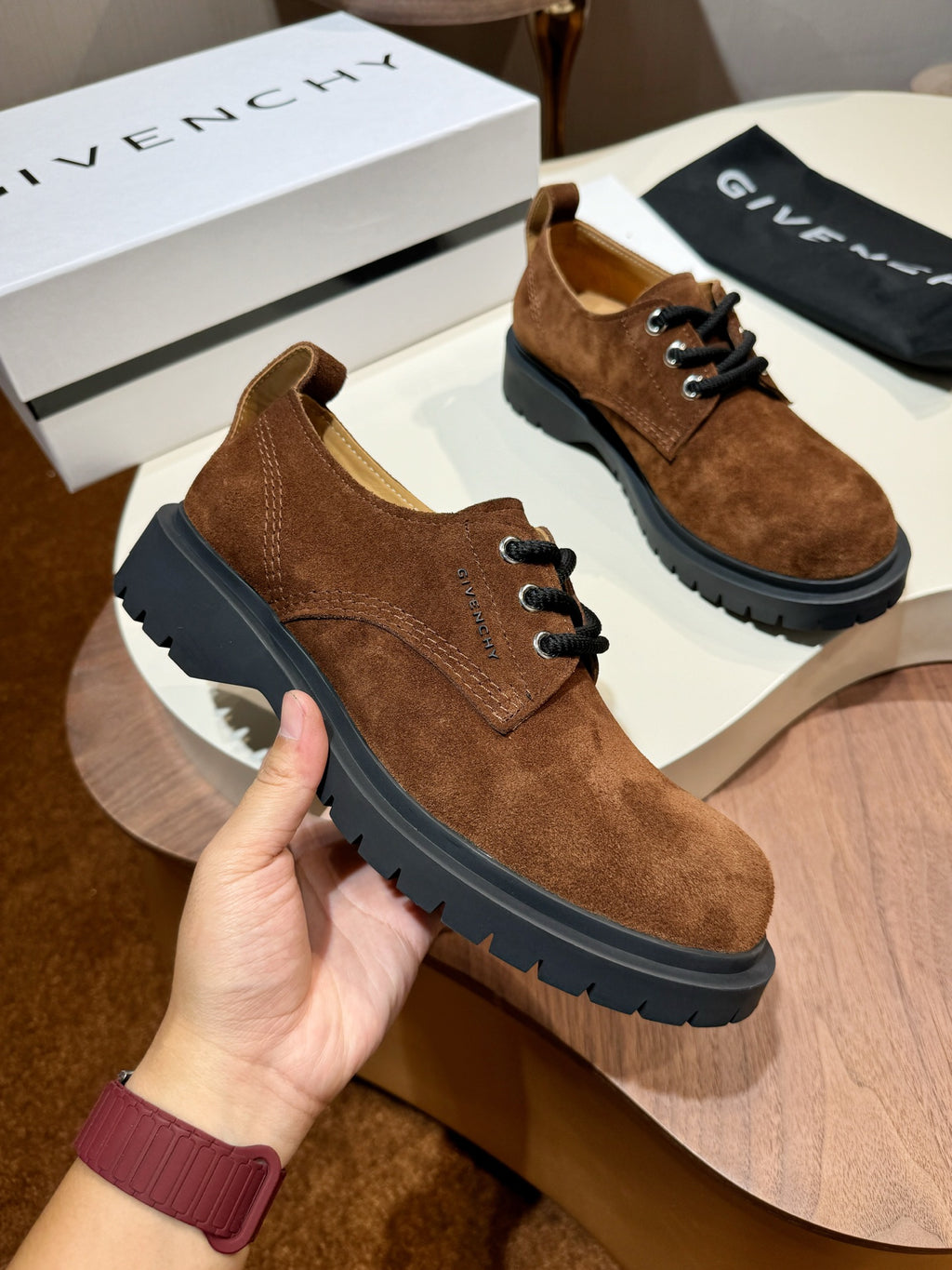 Brown suede lace-up shoe with black chunky sole and round toe