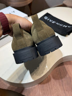 Givenchy olive suede lace-up shoes, rear view with black treaded sole