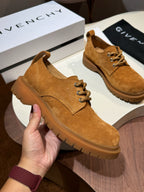 Tan suede lace-up shoes with round toe and brown lug sole