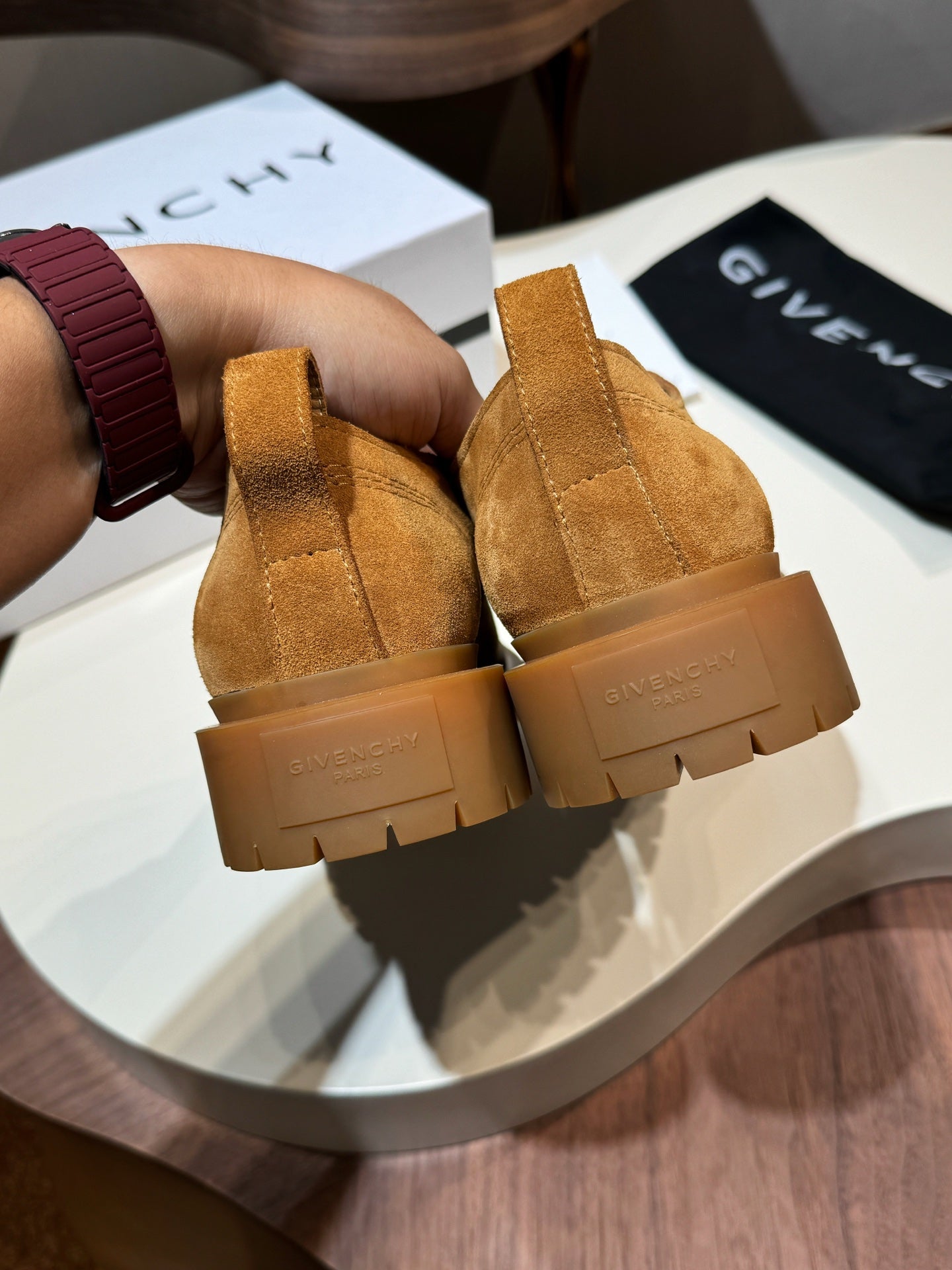 Tan suede lace-up shoes with heel pull tab and brown lug sole