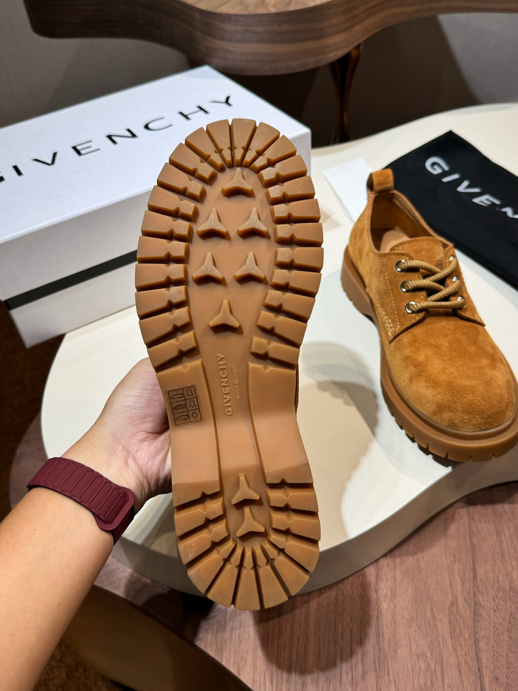 Tan suede shoes with outsole tread detail and brown rubber lug sole