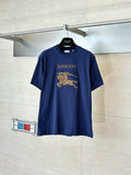 Dark blue short-sleeve T-shirt with Burberry logo and gold horse graphic