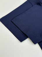 Dark blue short-sleeve T-shirt with ribbed crew neck and stitched hem