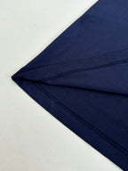 Dark blue T-shirt sleeve hem seam detail