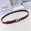 Dior leather belt in burgundy with gold-tone buckle and star-and-flower charm