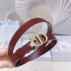 Dior burgundy belt with gold buckle and dangling star-and-flower charm