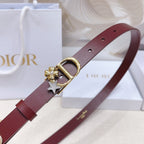 Dior burgundy belt close-up: gold buckle with star charm and pearl flower clusters