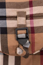 Burberry plaid puffer jacket hood strap buckle with black webbing