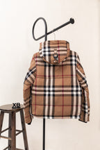 Hooded plaid puffer vest, back view, with brown, black, white, and red check pattern