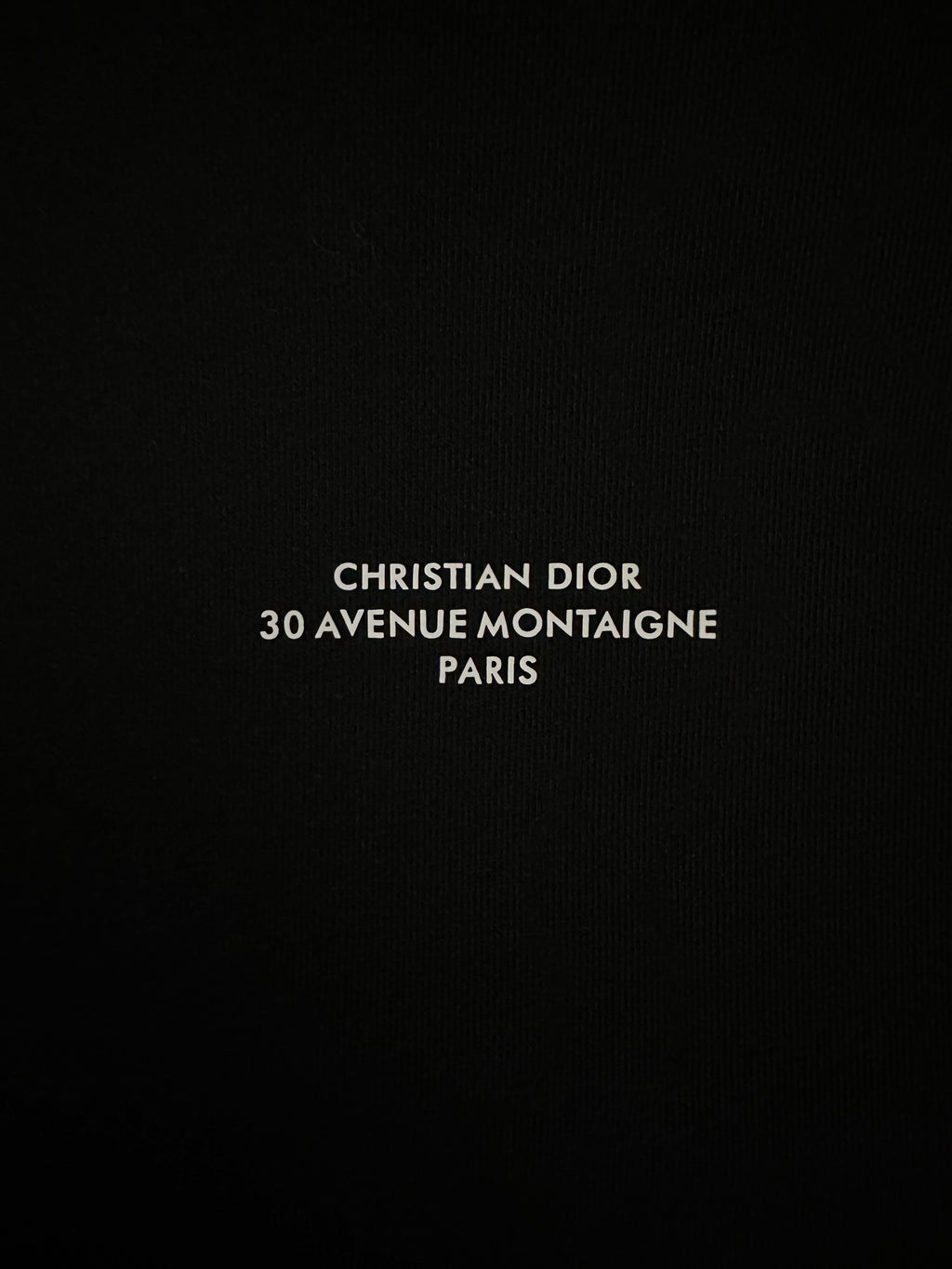 Black sweatshirt chest print: CHRISTIAN DIOR 30 AVENUE MONTAIGNE PARIS