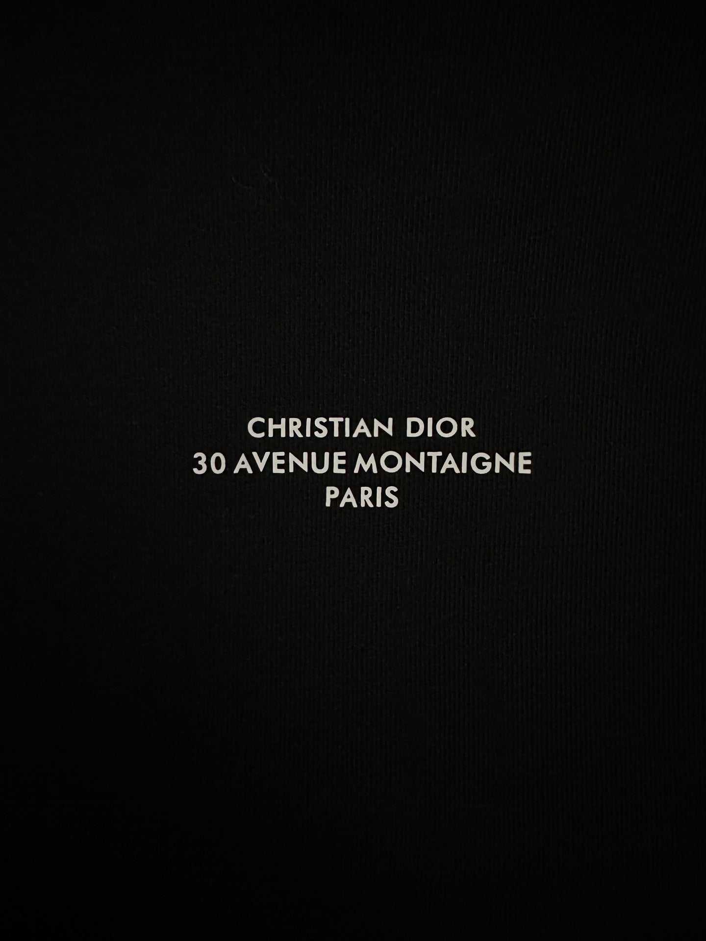 Black sweatshirt chest print: CHRISTIAN DIOR 30 AVENUE MONTAIGNE PARIS
