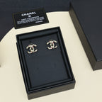 Gold-tone logo stud earrings with pink stones and faux pearls, boxed set
