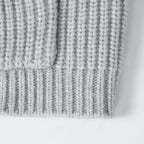 Light gray ribbed knit hoodie hem with vertical stitch texture