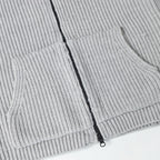 Light gray knit hoodie front with black zipper and ribbed waistband