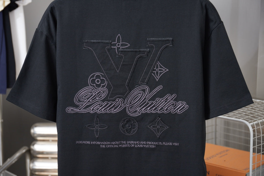 Black short-sleeve T-shirt back view with large LV-style monogram and script graphic