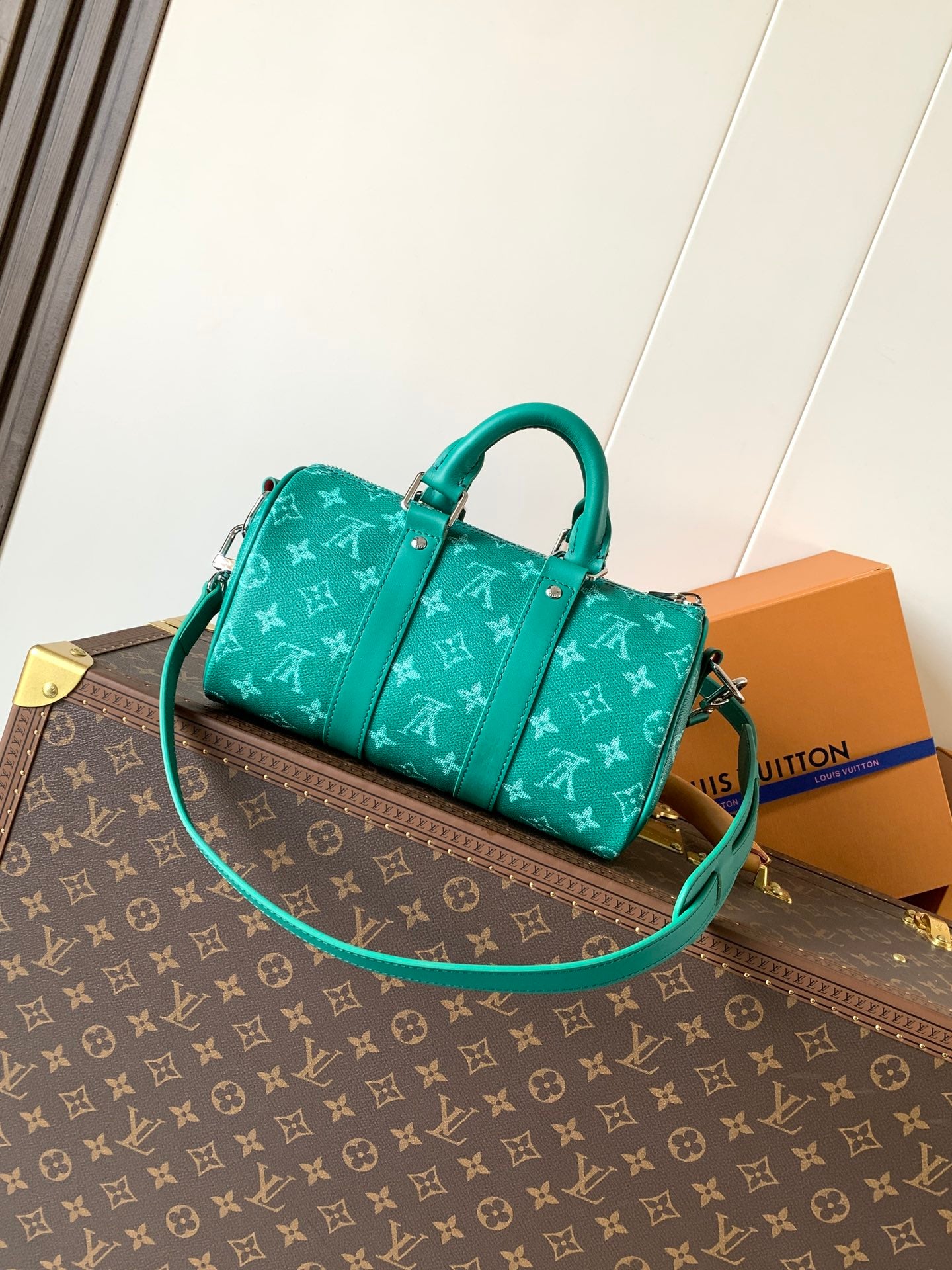Louis Vuitton green monogram handbag with two top handles and long strap