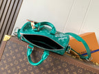 Louis Vuitton green monogram mini bag with open zip and top handle