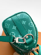 Louis Vuitton green monogram bag with silver D-ring hardware and strap