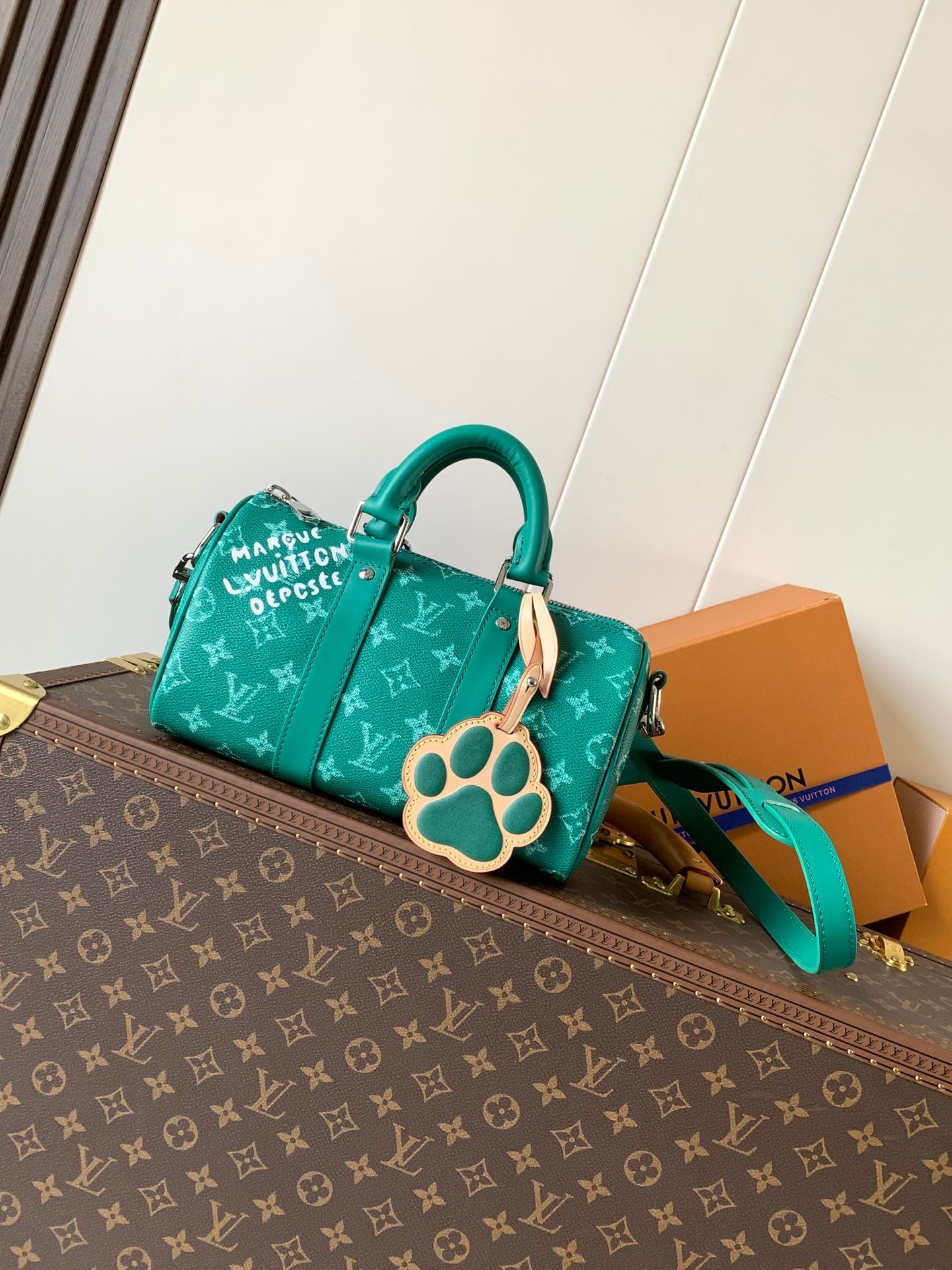 Louis Vuitton green monogram handbag with top handles and crossbody strap