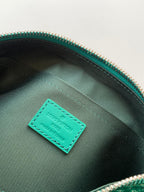 Louis Vuitton green interior pocket tag on monogram bag